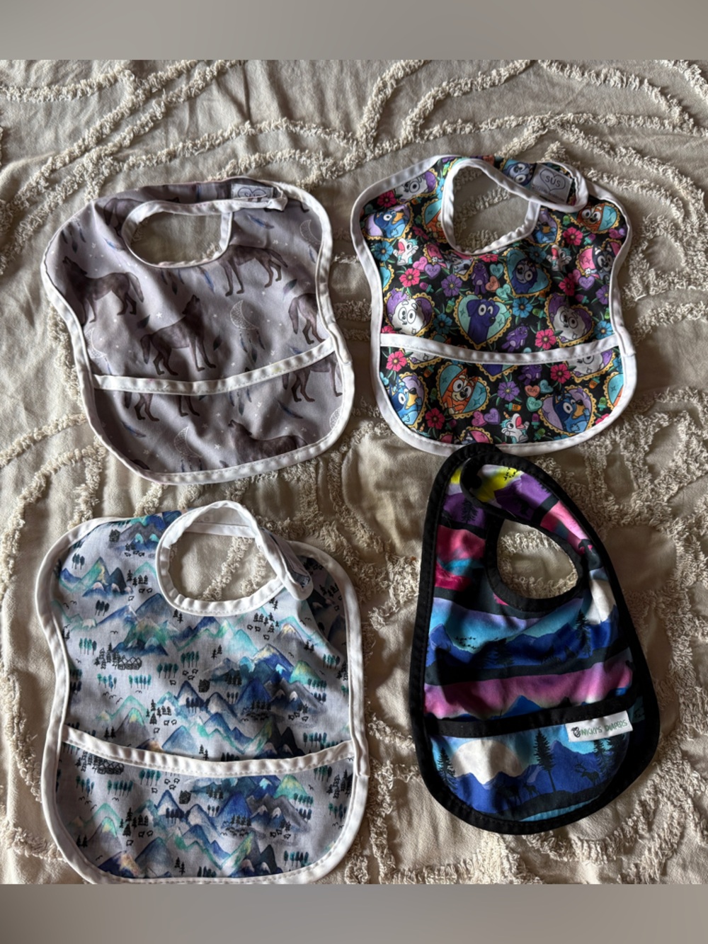 Assorted Kids Bibs Pack - 3 bibs by Sustainable Sprinkles (SUS) and 1 by Nicky’s